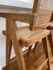 
Close-up detail of teak wood joinery
Teak wood lounge chair with sculptural silhouette