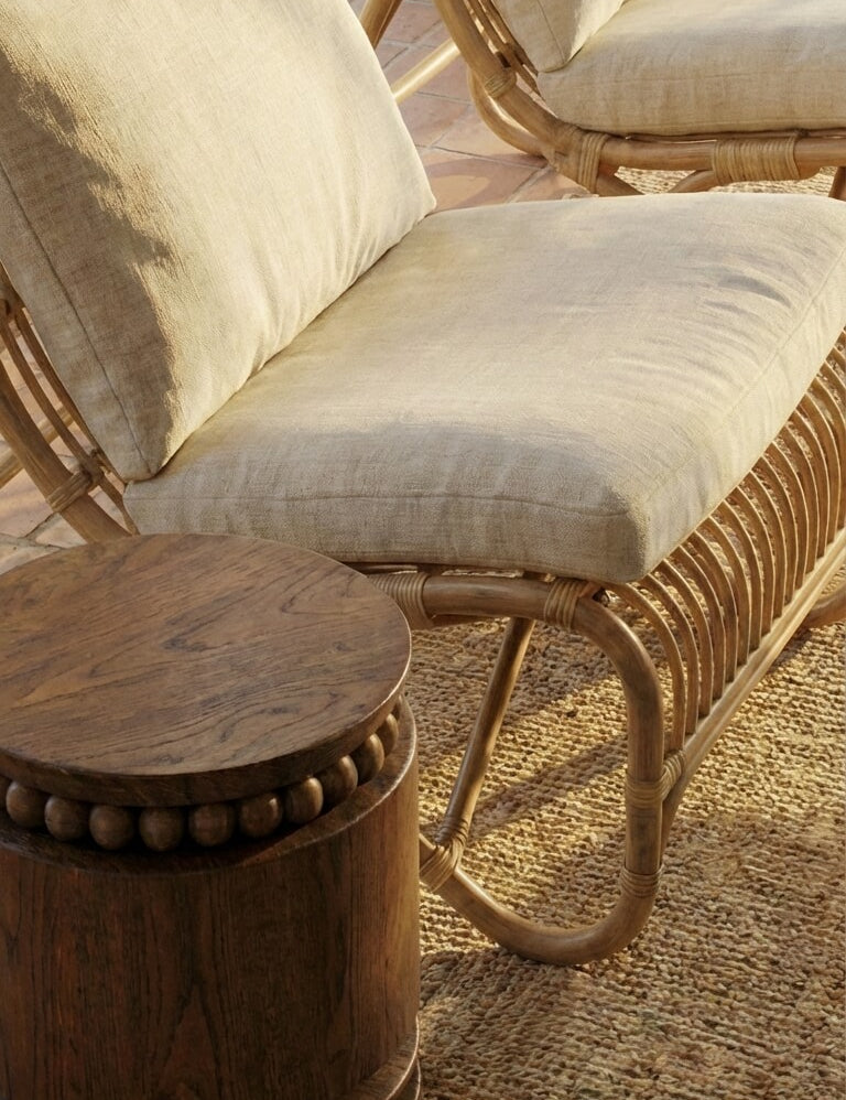 Natural teak wood coffee table in coastal style interior
