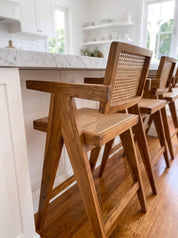 
Close-up detail of teak wood joinery
Teak wood lounge chair with sculptural silhouette