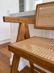 Teak wood accent chair in contemporary home
