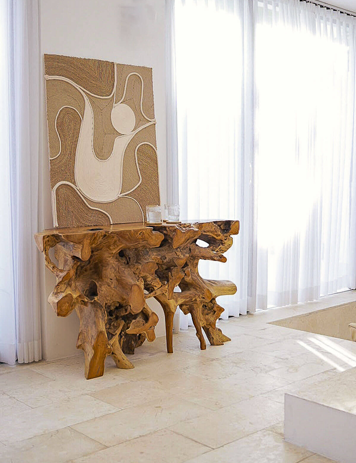 Wooden chair with abstract design backrest in a bright room