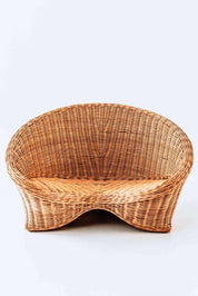 Indiana Yoga Chair handcrafted from sustainable rattan wood in natural and grey tones, ergonomic backrest and curved armrests for yoga, meditation, or relaxation, lightweight and eco-friendly indoor and outdoor seating